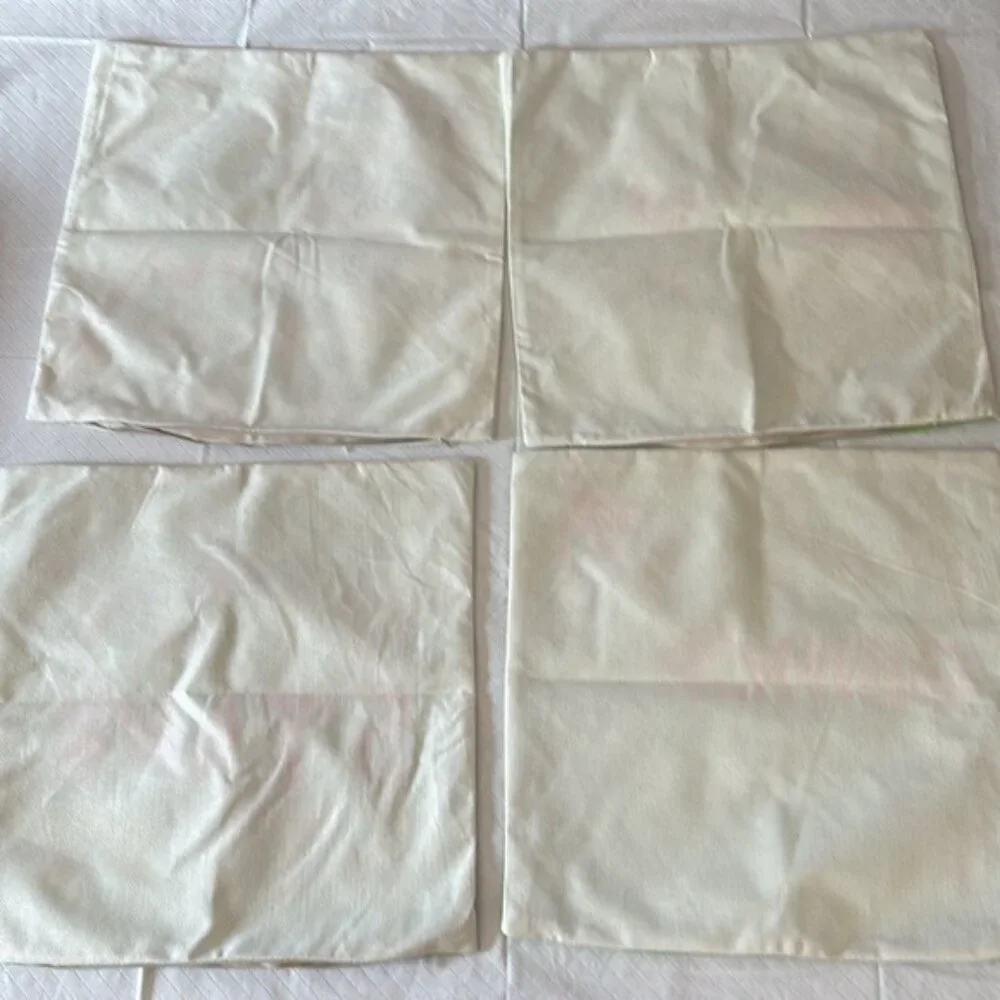 Four 17 x 17 grinch pillow covers, with zipper closings